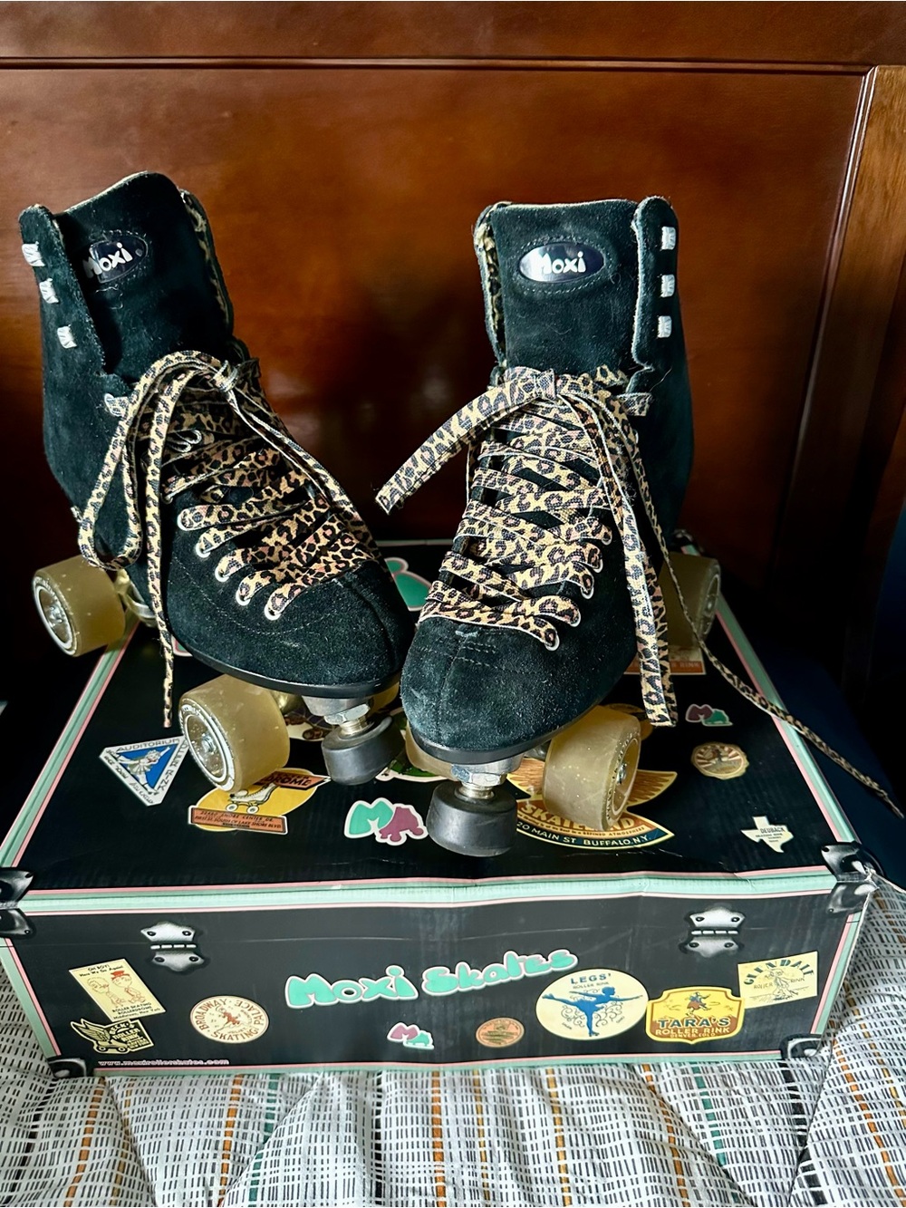 Moxi Women's Black Suede Roller Skates with Leopard Laces
